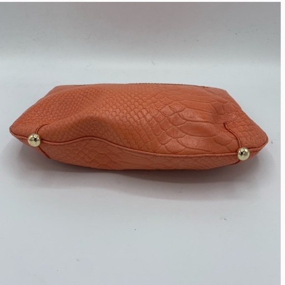 Beautiful Korto Momolu Clutch
Fun pattern,Coral colored exterior, EUC - Picture 5 of 7